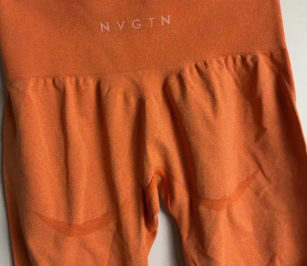 NVGTN Seamless High Waisted Leggings Size Medium Orange Athletic Gym Women’s